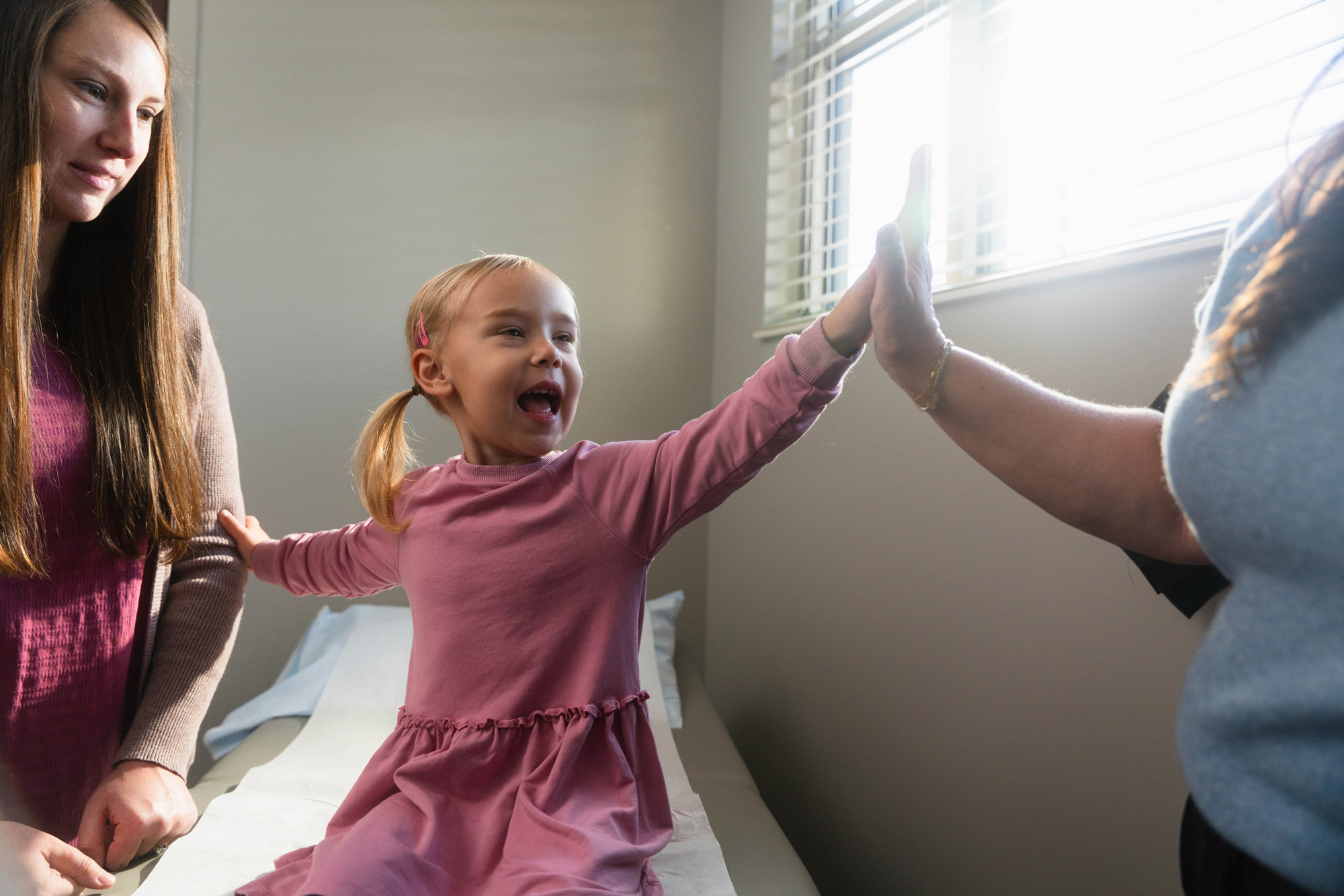 fallbrook family patient high fiving provider